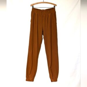 Wolven Jogger Pants in Turmeric Amber with pockets. US Size XL.